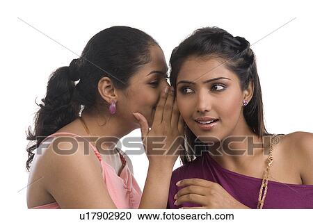 Two Women Whispering View Large Photo Image Stock Image - Two Women Whispering. Fotosearch