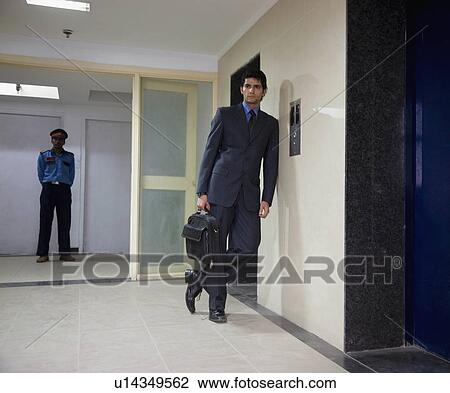 Stock Image - Waiting for the elevator. Fotosearch