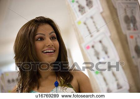 Woman at jewellery shop View Large Photo Image Stock Photo - Woman at jewellery shop. Fotosearch