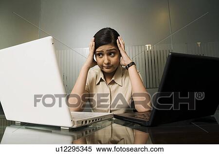 Woman executive stressed out View Large Photo Image Stock Photography - Woman executive stressed out. Fotosearch
