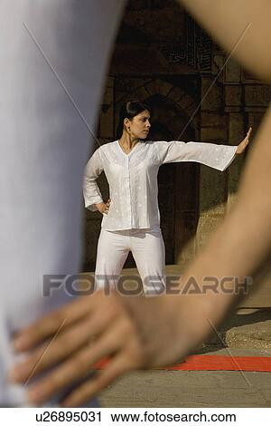 Stock Image - Woman exercising. Fotosearch