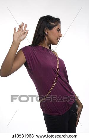 Woman making a hand gesture View Large Photo Image Stock Image - Woman making a hand gesture. Fotosearch