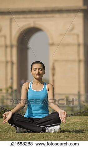 Stock Photo - Woman meditating. Fotosearch