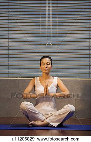 Woman practising Yoga View Large Photo Image Stock Photo - Woman practising Yoga. Fotosearch
