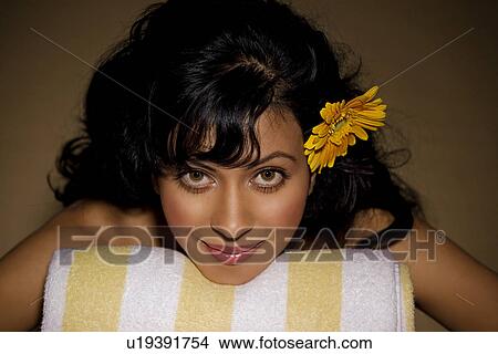 Picture - Woman relaxing at a spa. Fotosearch