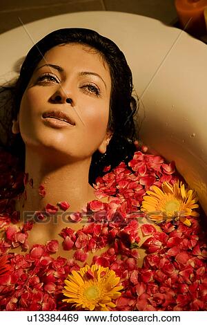 Stock Photo - Woman relaxing at a spa. Fotosearch