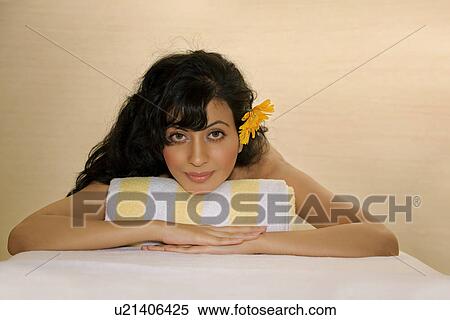 Stock Photography - Woman relaxing at a spa. Fotosearch