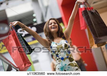 Woman shopping View Large Photo Image Stock Image - Woman shopping. Fotosearch