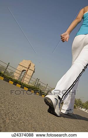 Woman walking View Large Photo Image Stock Photo - Woman walking. Fotosearch