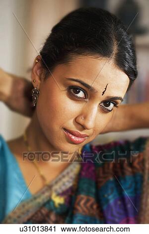 Stock Image - Woman wearing mangalsutra. Fotosearch