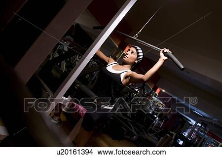Woman working out View Large Photo Image Picture - Woman working out. Fotosearch