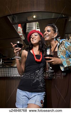 Women at the bar View Large Photo Image Stock Photo - Women at the bar. Fotosearch