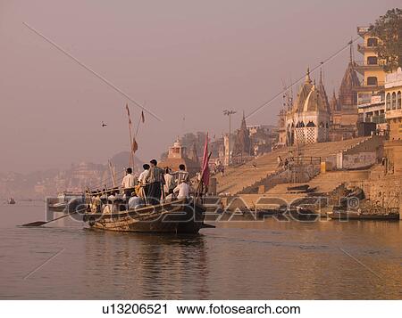 Boat of pilgrims on the Ganges River in India View Large Photo Image Stock Image - Boat of pilgrims on the Ganges River in India. Fotosearch