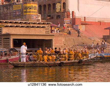 Boat of pilgrims on the Ganges River in India View Large Photo Image Stock Photograph - Boat of pilgrims on the Ganges River in India. Fotosearch