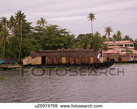 Stock Photo - "Boat on backwater, Kerala, South India". Fotosearch