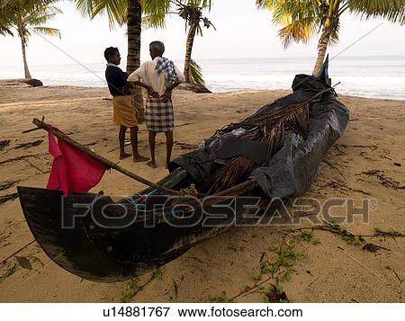 Stock Photo - "Boat on the shoreline, Kerala, India". Fotosearch