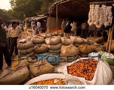 "Bundles at an open market in Agra, India" View Large Photo Image Stock Image - "Bundles at an open market in Agra, India". Fotosearch
