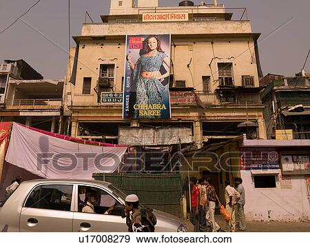 Car and people outside a building in Delhi India View Large Photo Image Stock Photo - Car and people outside a building in Delhi India. Fotosearch