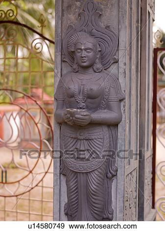 Stock Photo - Carved figurine on Hindu Temple in Kerala India. Fotosearch