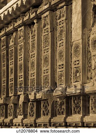 Picture - "Carvings on wall in Abandon City of Fatehpur, Rajasthan India". Fotosearch