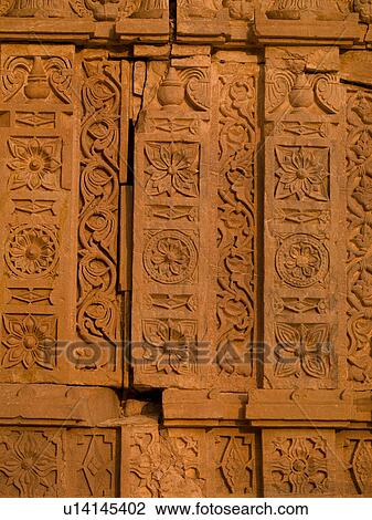 Stock Image - "Carvings on wall in Abandon City of Fatehpur, Rajasthan India". Fotosearch