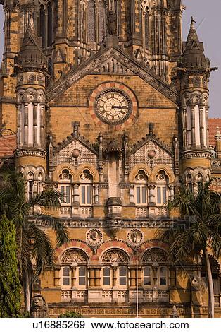 Clock on exteror of building in Mumbai View Large Photo Image Stock Photo - Clock on exteror of building in Mumbai. Fotosearch