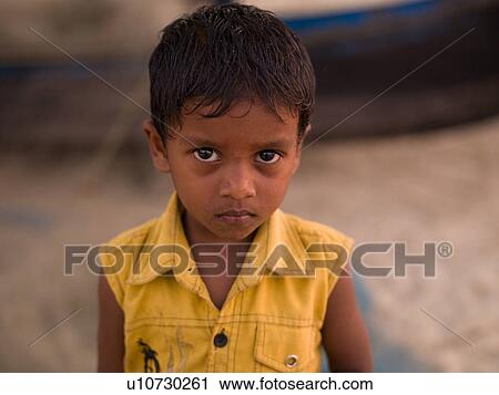 Stock Image - Close up of a young boy in India. Fotosearch
