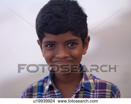 Picture - Close up of young boy in India. Fotosearch