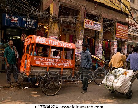 Covered cart behind a bicycle n India View Large Photo Image Picture - Covered cart behind a bicycle n India. Fotosearch