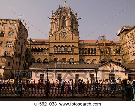 Stock Image - Crowd of people outside a building in Mumbai India. Fotosearch