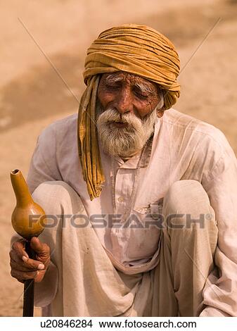 Picture - Elderly bearded man in India. Fotosearch