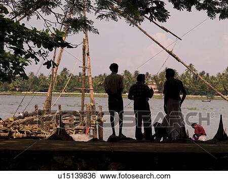 Stock Photograph - "Fisherman in, Cochin, India". Fotosearch