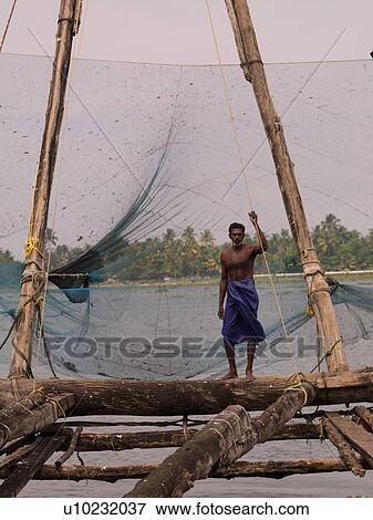 Stock Photo - Fisherman in India. Fotosearch