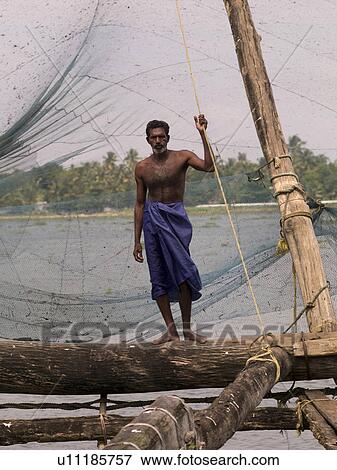 Stock Photo - Fisherman in India. Fotosearch
