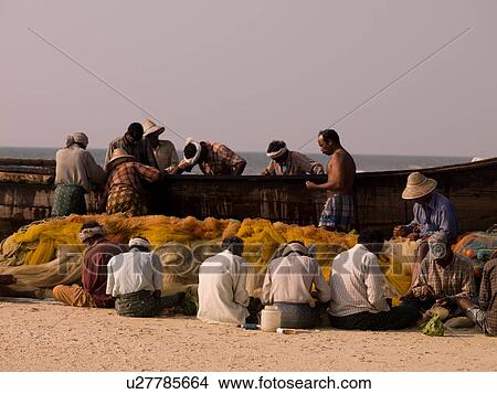 Fisherman on the beach of Arabian Sea View Large Photo Image Picture - Fisherman on the beach of Arabian Sea. Fotosearch