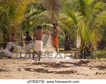 Fisherman on the beach of Arabian Sea View Large Photo Image Stock Image - Fisherman on the beach of Arabian Sea. Fotosearch