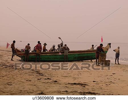 Fisherman on the beach of Arabian Sea View Large Photo Image Stock Photo - Fisherman on the beach of Arabian Sea. Fotosearch