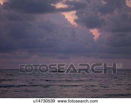 Stock Photo - "Fishing boat on the Arabian Sea, Kerala, India". Fotosearch