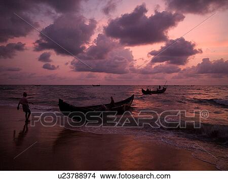 "Fishing boat on the beach of the Arabian Sea, Kerala, India" View Large Photo Image Picture - "Fishing boat on the beach of the Arabian Sea, Kerala, India". Fotosearch