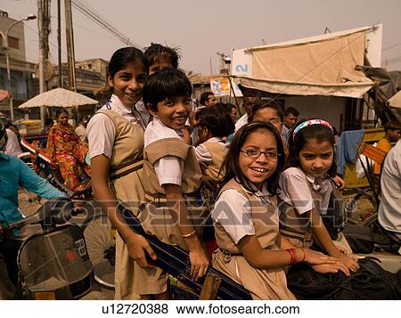 Girls in carriage of bike ride View Large Photo Image Stock Photo - Girls in carriage of bike ride. Fotosearch