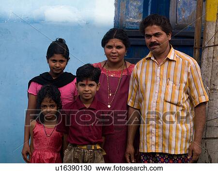 Indian family posing View Large Photo Image Stock Image - Indian family posing. Fotosearch