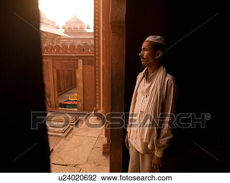 Indian man looking out window in India View Large Photo Image Stock Image - Indian man looking out window in India. Fotosearch