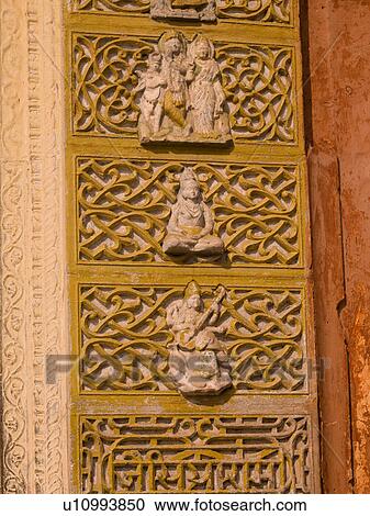 Stock Image - "Jaipur, India - carvings on exterior wall". Fotosearch