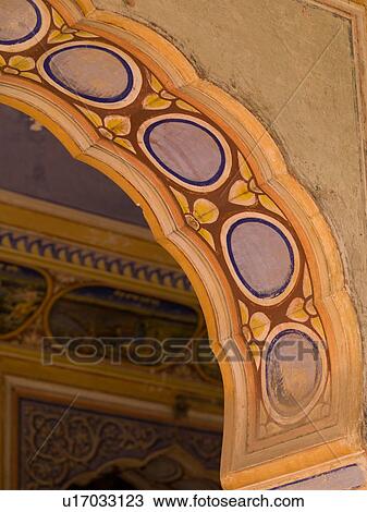 Stock Image - "Jaipur, India - painted detailing on archway". Fotosearch