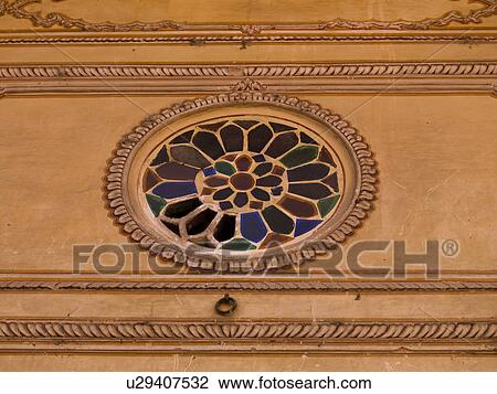 Stock Image - "Jaipur, India - painting on exterior wall". Fotosearch