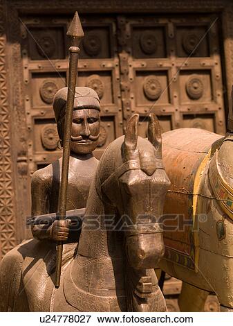 Stock Photo - "Jaipur, India - statue of a man on a horse". Fotosearch
