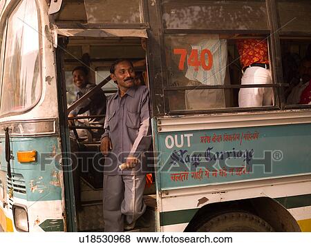 Man on bus in India View Large Photo Image Stock Photo - Man on bus in India. Fotosearch