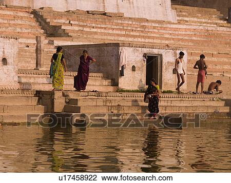 People at the edge of the Ganges River in India View Large Photo Image Stock Image - People at the edge of the Ganges River in India. Fotosearch