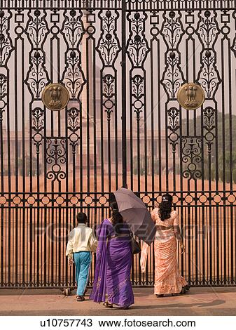 People standing outside gate in Delhi India View Large Photo Image Stock Image - People standing outside gate in Delhi India. Fotosearch