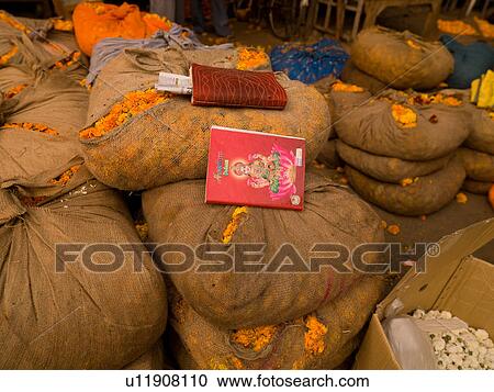 Stock Image - "Piles of sacks in Agra, India". Fotosearch